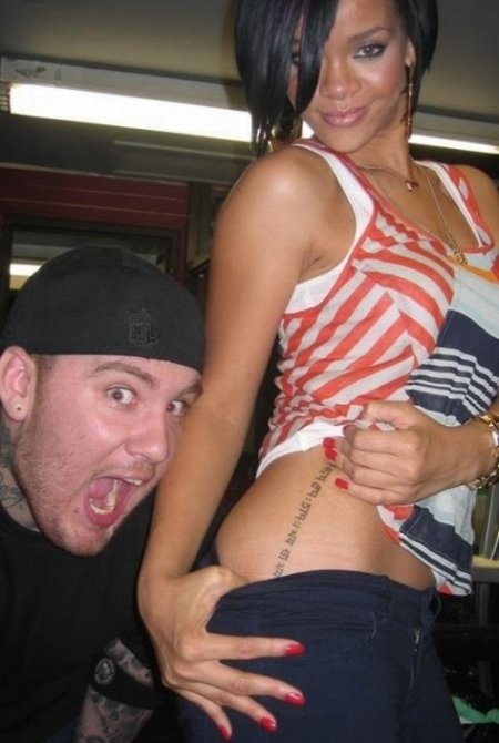 under the gun tattoo. Rihanna And Her Gun Tattoo